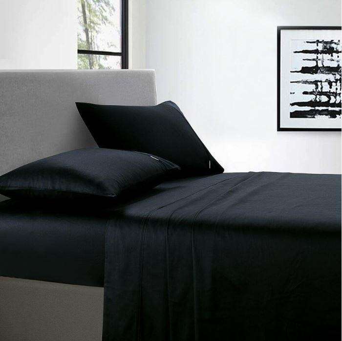 Black bed sheet and pillows