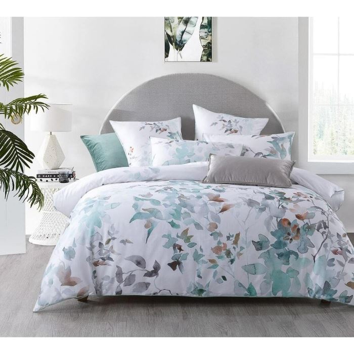A bed with floral Botanist Quilt cover from Machester Collection