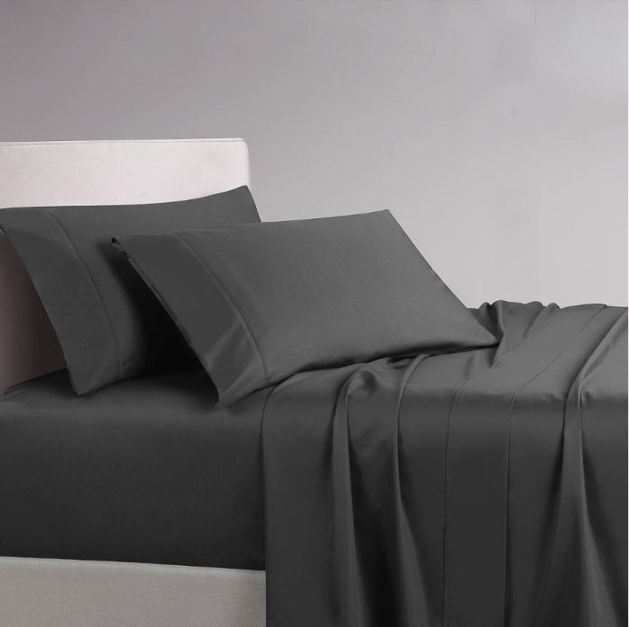 Grey sheet set on a bed