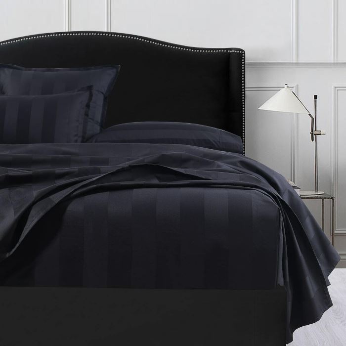 Black Mega queen sheet from on a bed