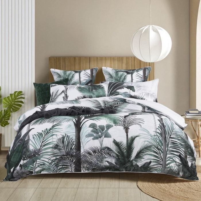 tropical quilt cover print on a bed