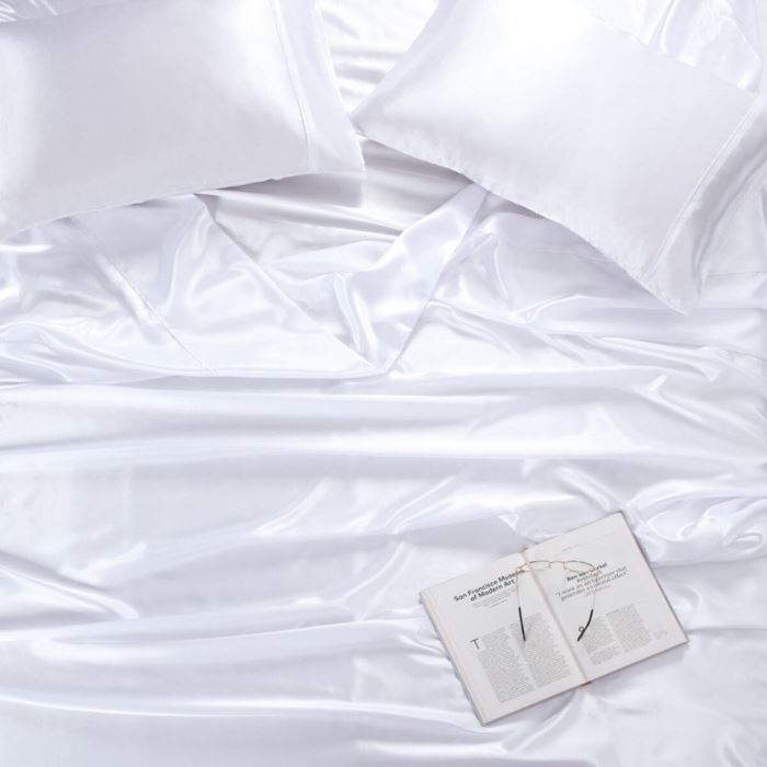 White satin sheet and a book