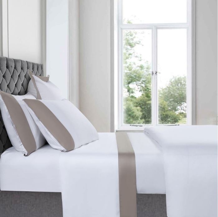White sheet set on a bed