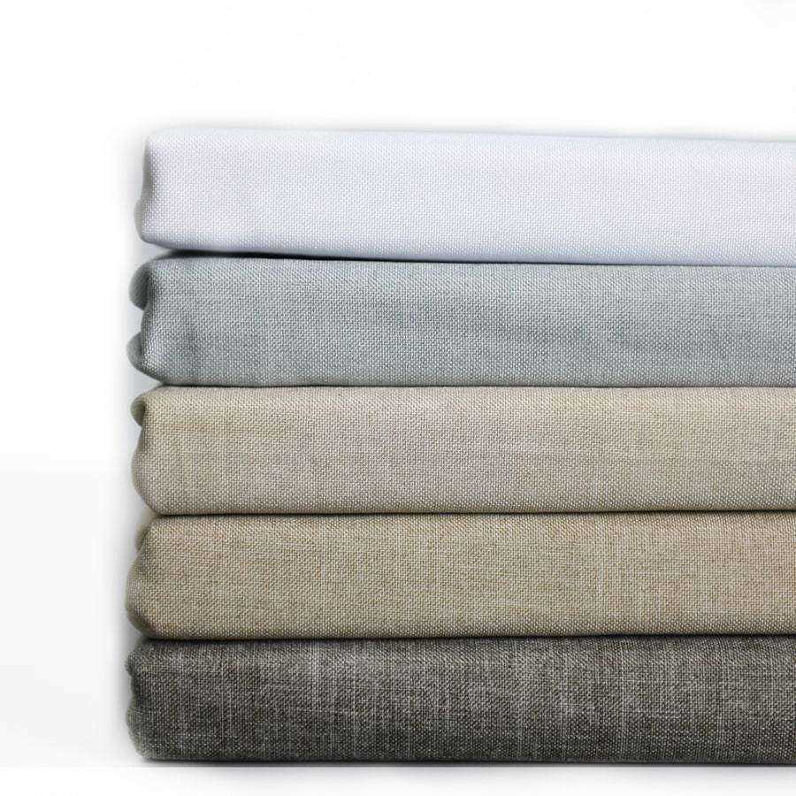 folded up grey tablecloths